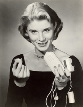 Publicity photo for the Sonotone Model 222 hearing aid, 1957